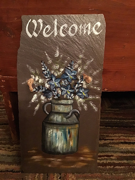 Handmade painting of milk jug with flowers