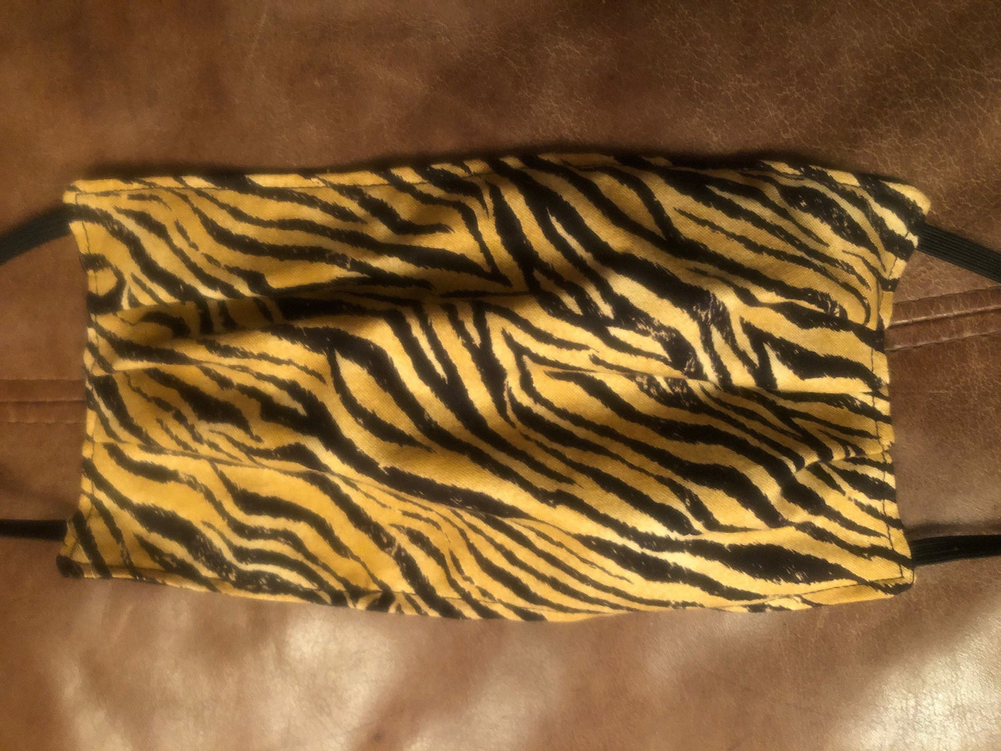 Handmade reversible face mask with tiger print