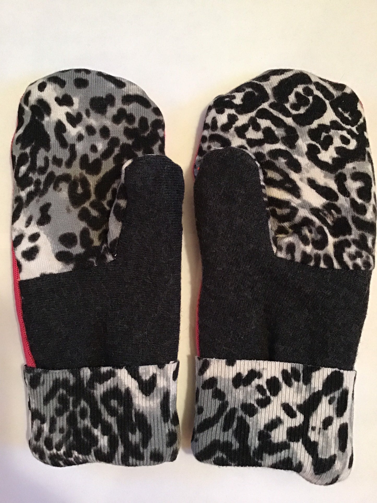 Handmade mittens from sweaters. Hot pink and black and white leopard print